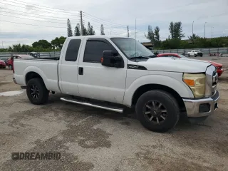 2012 Ford F-250 XL with VIN 1FT7X2A61CEC15533, listed as a Copart auction lot 57883444 with 195,030 mi miles and Salvage title. Bid and sale history available at DreamBid. Image 4.