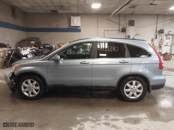2009 Honda CR-V EX-L with VIN 5J6RE48739L037292, listed as a IAAI auction lot 41121290 with 150,597 mi miles. Bid and sale history available at carsss.com. Image 14.