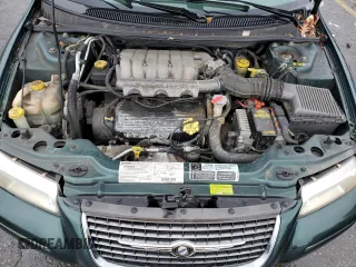 1999 Chrysler Cirrus LXi z VIN 1C3EJ56H2XN637180, wystawiony jako Copart lot #81729684 z przebiegiem 80 115 mil mil oraz Tytuł czysty. Historia ofert i sprzedaży dostępna na DreamBid. Obrazek 11.