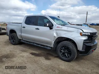 2021 Chevrolet Silverado 1500 LT Trail Boss with VIN 3GCPYFEL2MG130876, listed as a Copart auction lot 53039345 with 23,099 mi miles and Salvage Title. Bid and sale history available at DreamBid. Image 4.
