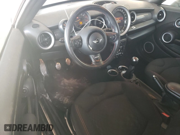 2015 MINI Roadster S z VIN WMWSY3C59FT566785, wystawiony jako Copart lot #73574064 z przebiegiem 96 623 mil mil oraz Tytuł czysty. Historia ofert i sprzedaży dostępna na DreamBid. Obrazek 8.
