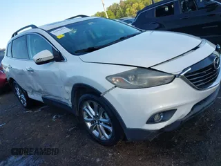 2013 Mazda CX-9 Grand Touring z VIN JM3TB2DA0D0423406, wystawiony jako IAAI lot #41984572 z przebiegiem 157 612 mil mil oraz . Historia ofert i sprzedaży dostępna na DreamBid. Obrazek 1.