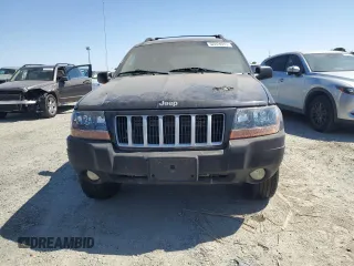 2004 Jeep Grand Cherokee Laredo with VIN 1J4GW48S84C182135, listed as a Copart auction lot 62224975 with 187,938 mi miles and Clean title. Bid and sale history available at DreamBid. Image 5.