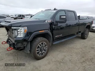 2021 GMC Sierra 3500HD AT4 z VIN 1GT49VEYXMF124749, wystawiony jako Copart lot #69328184 z przebiegiem 79 678 mil mil oraz Szkody całkowita. Historia ofert i sprzedaży dostępna na DreamBid. Obrazek 1.