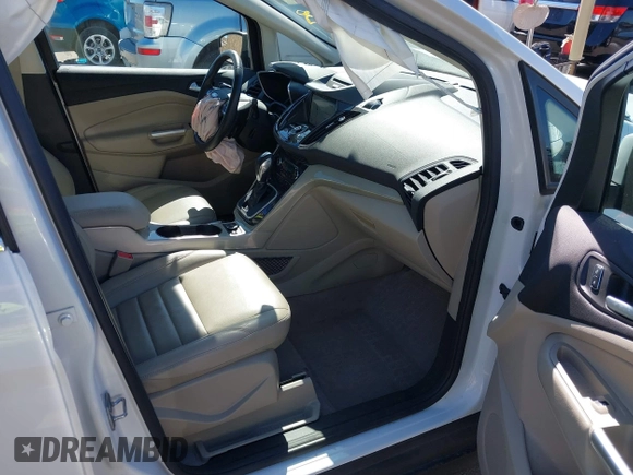2016 Ford C-Max SEL z VIN 1FADP5CU8GL119275, wystawiony jako IAAI lot #41878985 z przebiegiem 39 580 mil mil oraz . Historia ofert i sprzedaży dostępna na DreamBid. Obrazek 5.