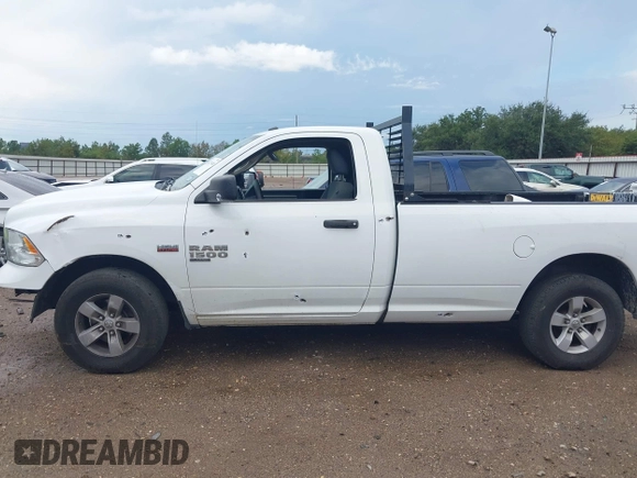 2019 Ram 1500 Classic Tradesman with VIN 3C6JR6DT8KG506165, listed as a IAAI auction lot 40721848 with 323,427 mi miles. Bid and sale history available at carsss.com. Image 14.