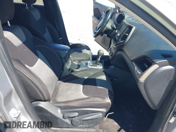2016 Jeep Cherokee Sport with VIN 1C4PJLAB0GW369428, listed as a IAAI auction lot 42264097 with 130,952 mi miles and . Bid and sale history available at DreamBid. Image 5.