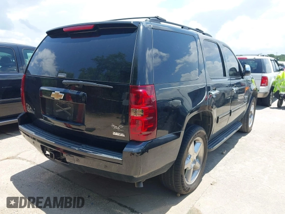 2011 Chevrolet Tahoe LT with VIN 1GNSCBE01BR389984, listed as a IAAI auction lot 42673033 with 289,294 mi miles and . Bid and sale history available at DreamBid. Image 4.