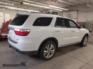 2013 Dodge Durango Crew with VIN 1C4SDJDT1DC540680, listed as a IAAI auction lot 41649262 with 106,016 mi miles. Bid and sale history available at carsss.com. Image 4.