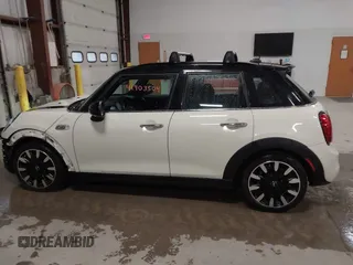 2019 MINI Hardtop 4 Door Cooper S with VIN WMWXU3C5XK2H88000, listed as a IAAI auction lot 41903504 with 60,245 mi miles and . Bid and sale history available at DreamBid. Image 15.