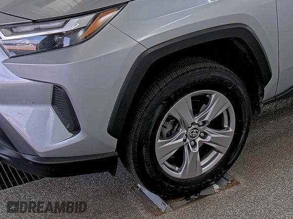 2023 Toyota RAV4 Hybrid XLE with VIN 2T3RWRFV9PW175446, listed as a IAAI auction lot 42806880 with 90,261 mi miles and . Bid and sale history available at DreamBid. Image 15.
