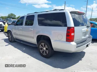 2012 Chevrolet Suburban LT with VIN 1GNSCJE04CR230288, listed as a IAAI auction lot 42049580 with 166,596 mi miles. Bid and sale history available at carsss.com. Image 3.