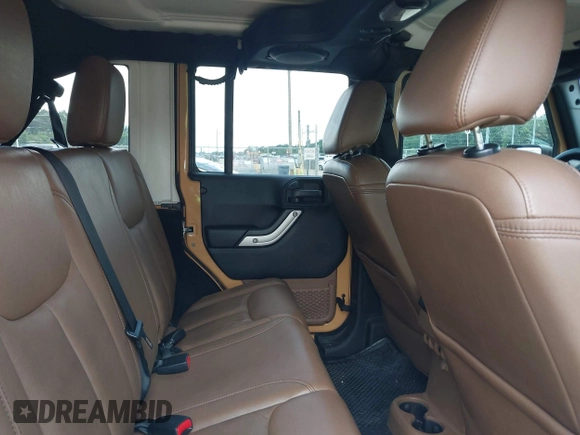 2013 Jeep Wrangler Unlimited Sahara with VIN 1C4BJWEG8DL638404, listed as a IAAI auction lot 42586604 with 43,953 mi miles and . Bid and sale history available at DreamBid. Image 8.
