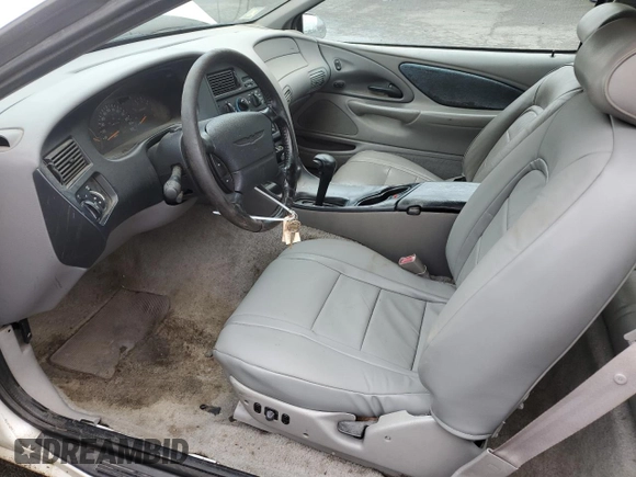1997 Ford Thunderbird LX z VIN 1FALP62W2VH154138, wystawiony jako Copart lot #46281235 z przebiegiem 145 738 mil mil oraz Tytuł czysty. Historia ofert i sprzedaży dostępna na DreamBid. Obrazek 7.
