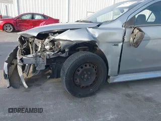 2015 Mitsubishi Lancer ES with VIN JA32U2FU8FU022850, listed as a IAAI auction lot 40731290 with 101,673 mi miles. Bid and sale history available at carsss.com. Image 6.