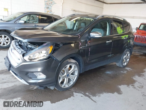 2019 Ford Escape Titanium with VIN 1FMCU9J95KUA19816, listed as a IAAI auction lot 41899819 with 71,760 mi miles and . Bid and sale history available at DreamBid. Image 17.