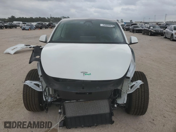 2023 Tesla Model Y Long Range z VIN 7SAYGDEE0PF802511, wystawiony jako Copart lot #54959415 z przebiegiem 12 902 mil mil oraz Szkoda całkowita • Salvage title. Historia ofert i sprzedaży dostępna na DreamBid. Obrazek 5.