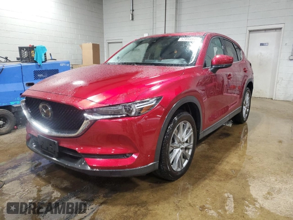 2020 Mazda CX-5 Grand Touring with VIN JM3KFBDM2L1771632, listed as a Copart auction lot 52894945 with 34,926 mi miles and Salvage Title. Bid and sale history available at carsss.com. Image 1.
