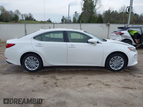 2015 Lexus ES 330 with VIN JTHBK1GGXF2209513, listed as a IAAI auction lot 41910570 with 141,084 mi miles and . Bid and sale history available at DreamBid. Image 13.