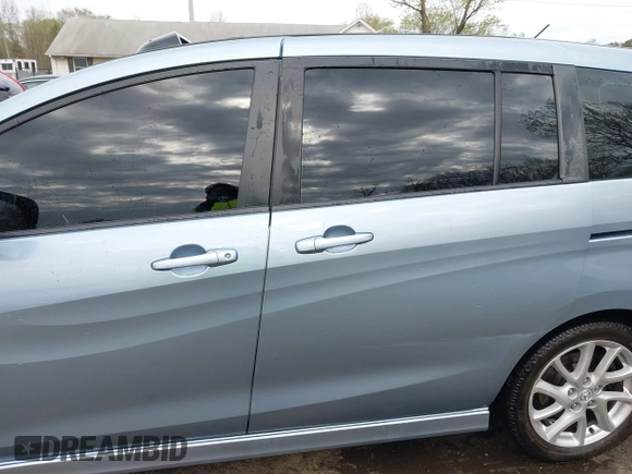 2012 Mazda 5 Grand Touring with VIN JM1CW2DL4C0141511, listed as a IAAI auction lot 42001392 with 99,097 mi miles and . Bid and sale history available at carsss.com. Image 14.
