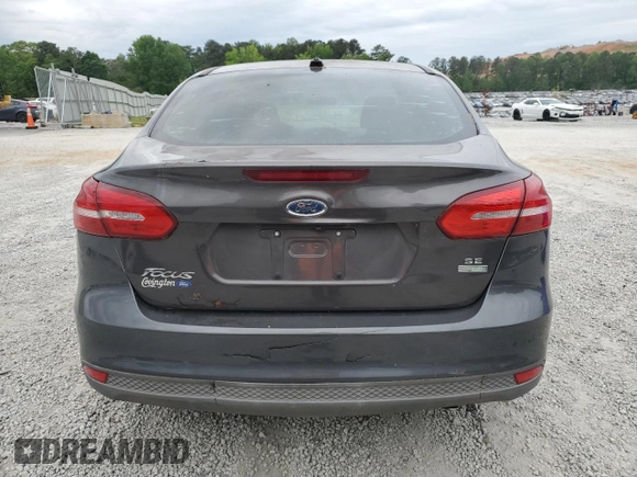 2018 Ford Focus SE z VIN 1FADP3FE1JL220741, wystawiony jako Copart lot #53755735 z przebiegiem Nie podano mil oraz Czysty tytuł • Clean title. Historia ofert i sprzedaży dostępna na DreamBid. Obrazek 6.