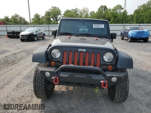 2013 Jeep Wrangler Sport z VIN 1C4AJWAG5DL671491, wystawiony jako Copart lot #59306745 z przebiegiem 111 778 mil mil oraz Szkoda całkowita • Salvage title. Historia ofert i sprzedaży dostępna na DreamBid. Obrazek 5.