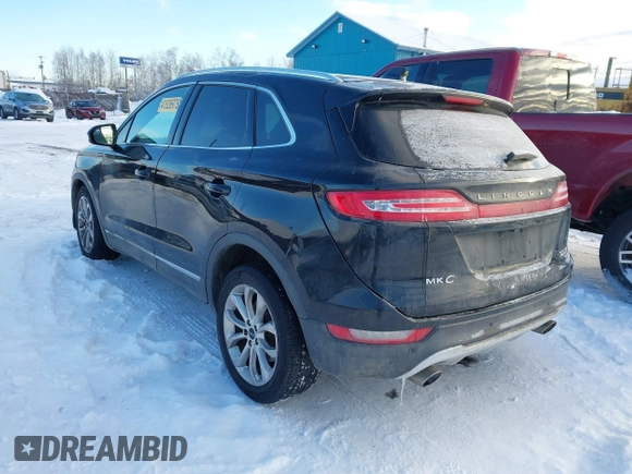 2015 Lincoln MKC with VIN 5LMTJ2AHXFUJ01440, listed as a IAAI auction lot 41526975 with 104,280 mi miles. Bid and sale history available at carsss.com. Image 3.