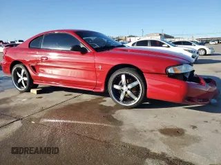 1996 Ford Mustang with VIN 1FALP4041TF234741, listed as a Copart auction lot 85277894 with 113,353 mi miles and Salvage Title. Bid and sale history available at carsss.com. Image 4.