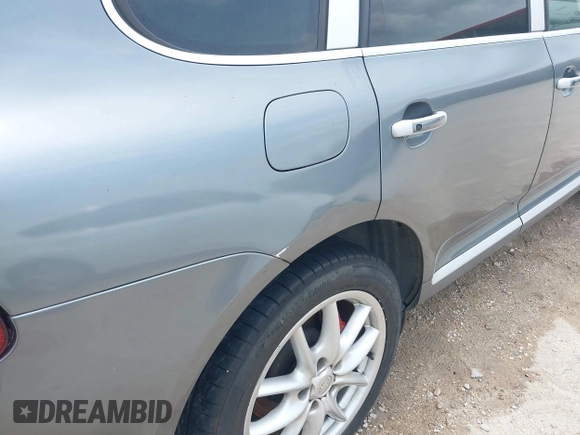 2005 Porsche Cayenne Turbo z VIN WP1AC29P25LA90019, wystawiony jako IAAI lot #42295764 z przebiegiem 164 927 mil mil oraz . Historia ofert i sprzedaży dostępna na DreamBid. Obrazek 6.