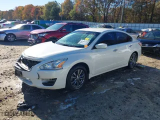2015 Nissan Altima 2.5 SV with VIN 1N4AL3AP6FC481782, listed as a IAAI auction lot 40911634 with 217,029 mi miles. Bid and sale history available at carsss.com. Image 2.