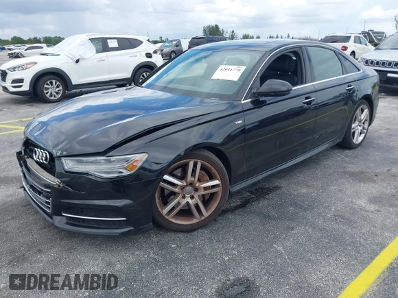 2016 Audi A6 2.0T Premium Plus with VIN WAUGFAFC6GN055826, listed as a IAAI auction lot 42011778 with 98,210 mi miles. Bid and sale history available at carsss.com. Image 17.