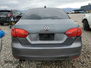 2014 Volkswagen Jetta SE z VIN 3VWD07AJ4EM239120, wystawiony jako Copart lot #57304045 z przebiegiem 183 748 mil mil oraz Szkoda całkowita • Salvage title. Historia ofert i sprzedaży dostępna na DreamBid. Obrazek 6.