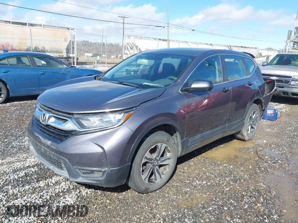 2018 Honda CR-V LX z VIN 2HKRW6H34JH202657, wystawiony jako IAAI lot #41568088 z przebiegiem Nie podano mil oraz . Historia ofert i sprzedaży dostępna na DreamBid. Obrazek 16.