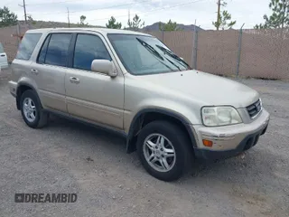 2000 Honda CR-V SE with VIN JHLRD1874YC046995, listed as a IAAI auction lot 42033059 with 218,484 mi miles. Bid and sale history available at carsss.com. Image 1.