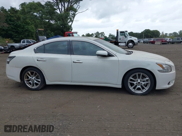 2014 Nissan Maxima S with VIN 1N4AA5AP1EC478918, listed as a IAAI auction lot 40426108 with 101,635 mi miles and . Bid and sale history available at DreamBid. Image 13.