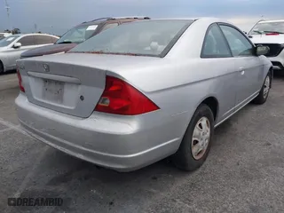 2002 Honda Civic LX with VIN 1HGEM22532L024309, listed as a IAAI auction lot 41777543 with 202,512 mi miles. Bid and sale history available at carsss.com. Image 4.