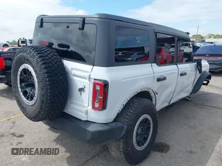 2022 Ford Bronco with VIN 1FMEE5DP1NLB31354, listed as a IAAI auction lot 40300510 with 8,980 mi miles. Bid and sale history available at carsss.com. Image 4.