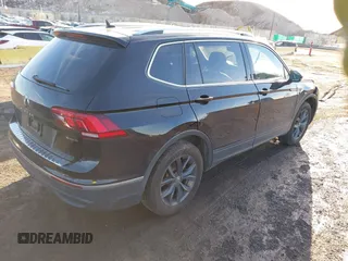 2023 Volkswagen Tiguan SE with VIN 3VVMB7AX8PM032557, listed as a IAAI auction lot 41585975 with 28,706 mi miles and . Bid and sale history available at DreamBid. Image 4.