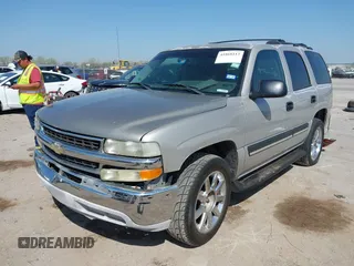 2004 Chevrolet Tahoe LT with VIN 1GNEC13Z84J315648, listed as a IAAI auction lot 41868112 with 198,901 mi miles. Bid and sale history available at carsss.com. Image 2.