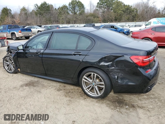 2017 BMW 7 Series 740i with VIN WBA7E2C50HG739520, listed as a Copart auction lot 88144025 with 0 mi miles and Salvage Title. Bid and sale history available at carsss.com. Image 2.