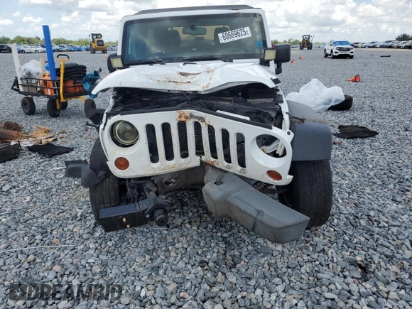 2012 Jeep Wrangler Unlimited Sport with VIN 1C4BJWDG6CL240673, listed as a Copart auction lot 60669625 with Not provided miles and Salvage title. Bid and sale history available at DreamBid. Image 5.