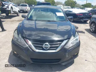 2018 Nissan Altima SV with VIN 1N4AL3AP8JC259494, listed as a IAAI auction lot 42041433 with 150,970 mi miles and . Bid and sale history available at DreamBid. Image 13.
