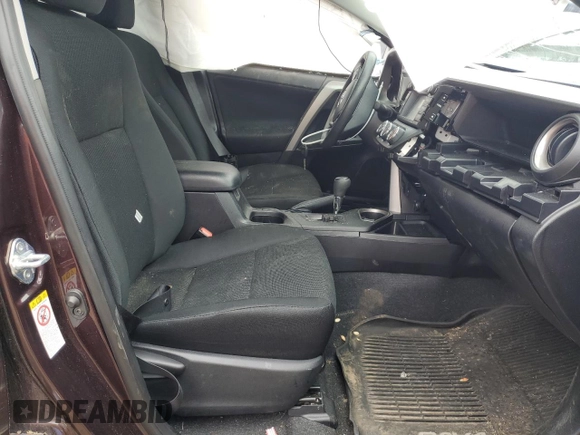2018 Toyota RAV4 LE with VIN 2T3BFREV0JW773614, listed as a Copart auction lot 57568865 with 76,429 mi miles and Clean title. Bid and sale history available at DreamBid. Image 7.