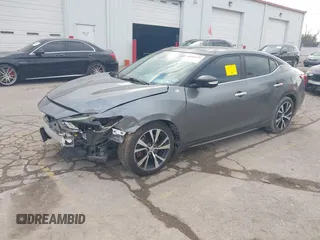 2017 Nissan Maxima S with VIN 1N4AA6AP1HC361740, listed as a IAAI auction lot 40868494 with 90,607 mi miles and . Bid and sale history available at DreamBid. Image 18.