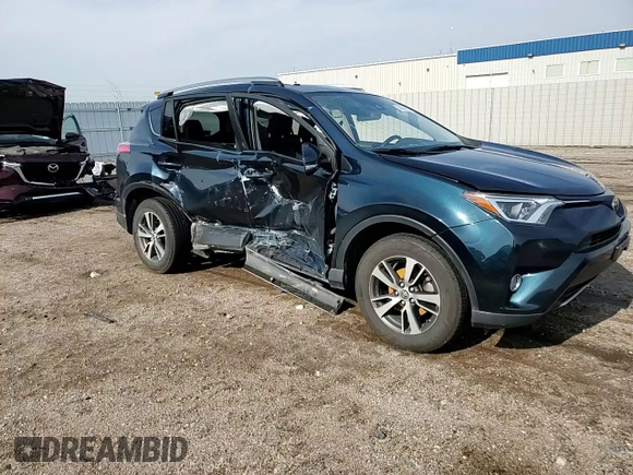2018 Toyota RAV4 XLE z VIN JTMRFREV1JJ242564, wystawiony jako Copart lot #59093405 z przebiegiem 111 174 mil mil oraz Szkoda całkowita • Salvage title. Historia ofert i sprzedaży dostępna na DreamBid. Obrazek 14.