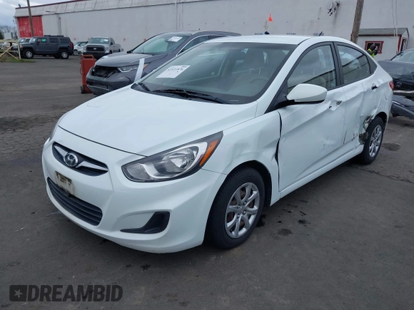 2013 Hyundai Accent GLS with VIN KMHCT4AE6DU291877, listed as a IAAI auction lot 41931876 with 136,781 mi miles. Bid and sale history available at carsss.com. Image 2.