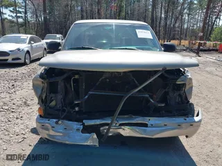 1999 Chevrolet Silverado 1500 LS with VIN 1GCEC19V1XZ189717, listed as a IAAI auction lot 41876614 with 217,019 mi miles. Bid and sale history available at carsss.com. Image 6.