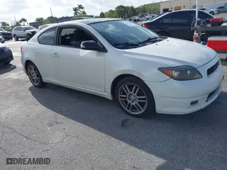 2007 Scion tC Spec with VIN JTKDE167370212813, listed as a IAAI auction lot 41719702 with 137,308 mi miles. Bid and sale history available at carsss.com. Image 1.