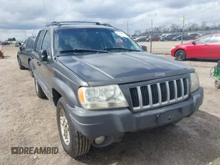 2004 Jeep Grand Cherokee Laredo z VIN 1J4GW48SX4C213322, wystawiony jako IAAI lot #41969362 z przebiegiem 273 876 mil mil oraz . Historia ofert i sprzedaży dostępna na DreamBid. Obrazek 1.