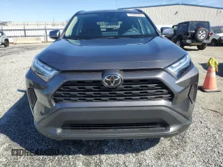 2023 Toyota RAV4 XLE with VIN 2T3W1RFV4PW240656, listed as a Copart auction lot 47028755 with 26,742 mi miles and Salvage Title. Bid and sale history available at carsss.com. Image 5.